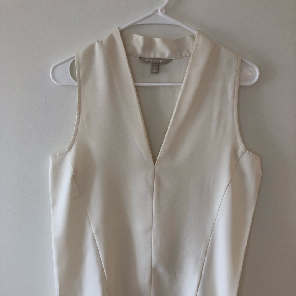 Cream-colored short-sleeved blouse